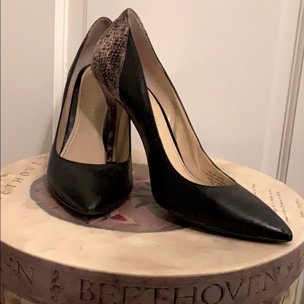 Black & snake skin pumps